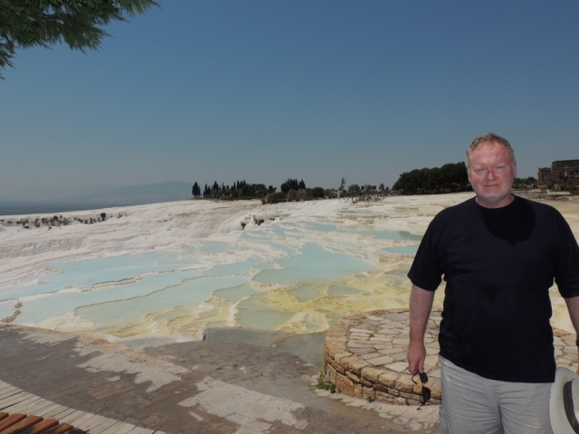 Pamukkale - Ian in front of travertine terraces on the site of the Rpman city of Heirapolis